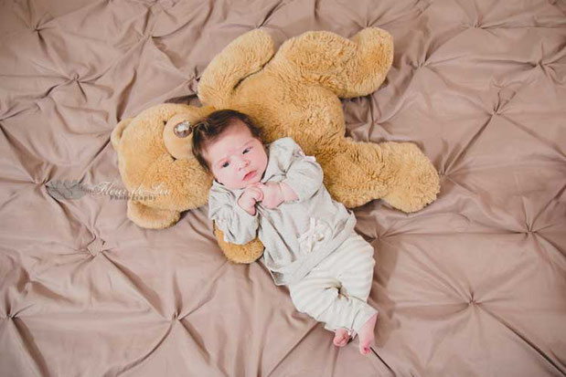 Rebecca pictured with a teddy bear once belonging to daddy when he was very little!