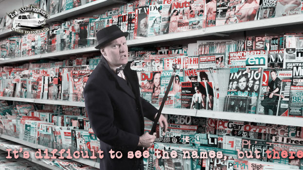 Photo of ZakWashington in a typical English newsagents with a magazine rack