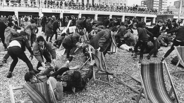 British culture photo: mods and rockers fighting on Brighton beach 1964