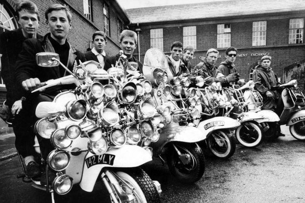 black and white photo of mods on scooters from 1964