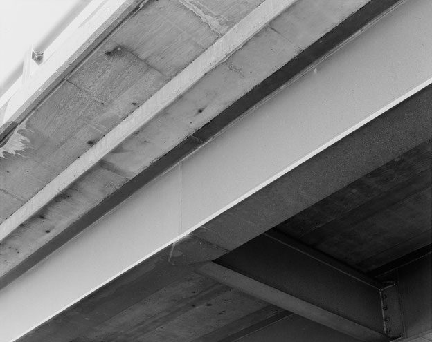 Detail of spandrel beam, showing typical welds and deck underside. View to southwest.