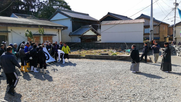 射手と的を持つ男たち