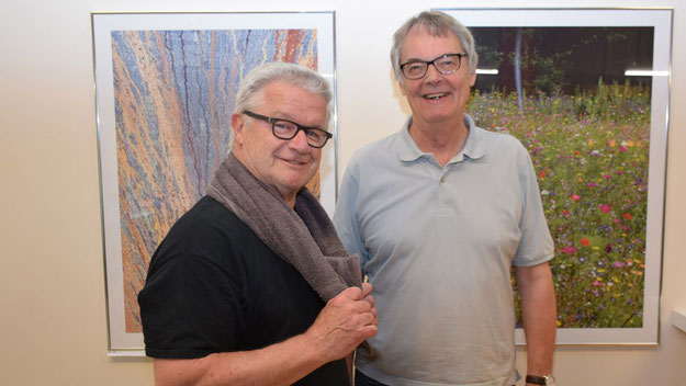 Jürgen Sohn, Vorsitzender des TuS Holstein, freut sich über den inspirierenden Wandschmuck im Fitness-Studio des Vereins. 