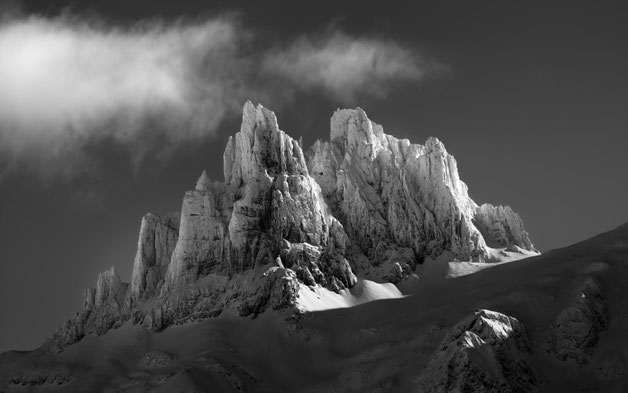 Black and white photograph of Gross Spannort in Engelberg, iconic Alpine peak in dramatic light.