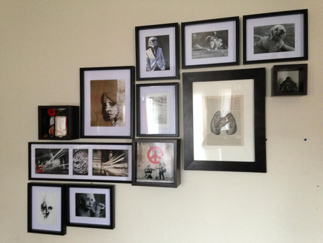 Dollar store frames, black and white art printed off the internet paired with personal momentos created a cool gallery wall for very little expenditure!