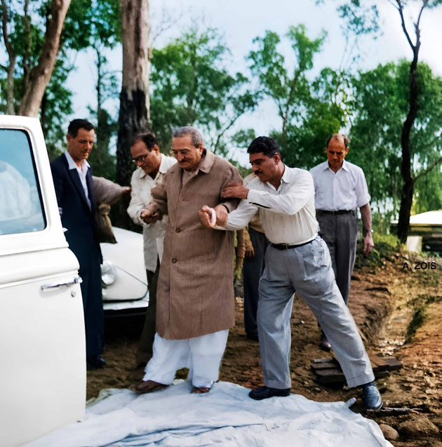 June 1958 : Meher Baba being helped to the motor vehicle at Avatar's Abode, Queensland, Australia. ( L-R ) Stan, Nariman Dadachnchi, Meher Baba, Eruch Jessawala & Dr.Denis O'Brien. Image rendered by Anthony Zois.