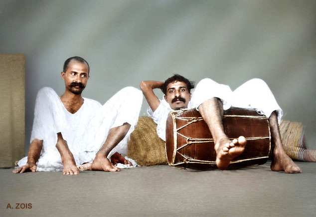 1922 - Bombay : Meher Baba and a dholak drum relaxing with Gustadji. Image rendered by Anthony Zois. BP