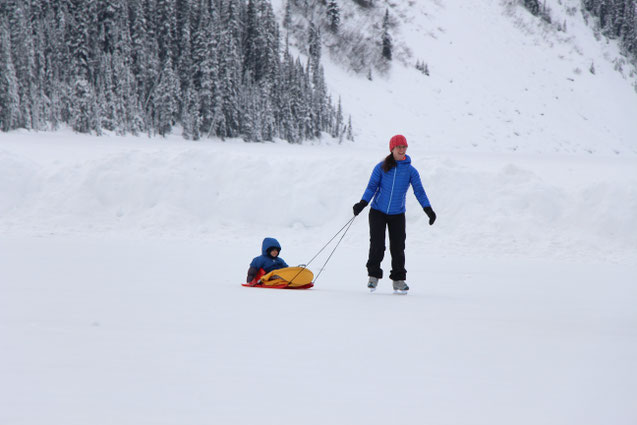 Skating With Baby in Sled