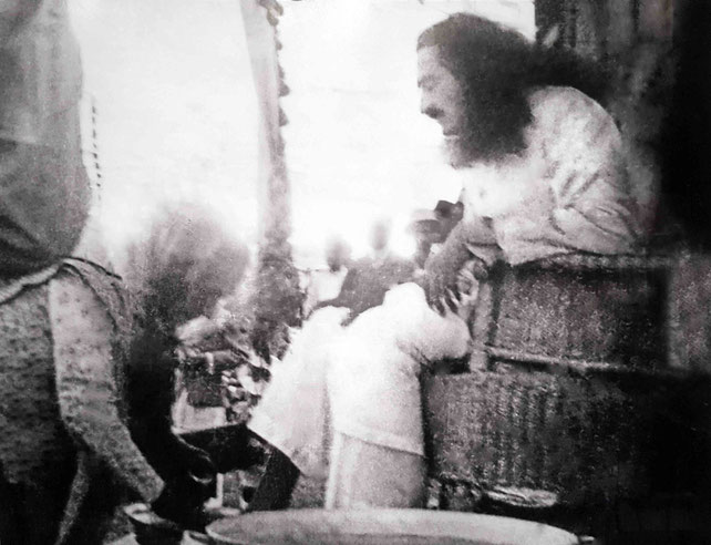 Shireenmai washing Meher Baba's feet 