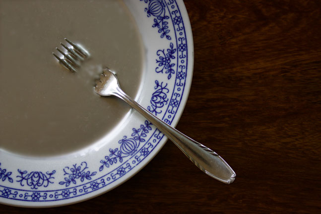 Mercury on a plate with a fork.