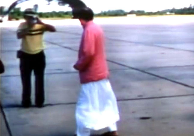 1956 : Joseph taking a photo of Baba arriving at Wilmington Airport, NC.