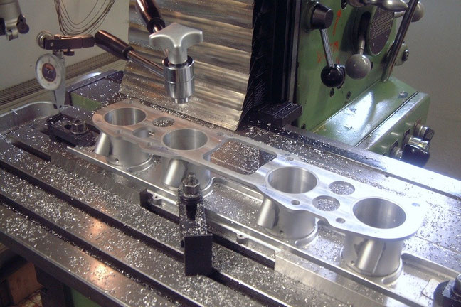 Machining the housings of the engine's custom slide throttles