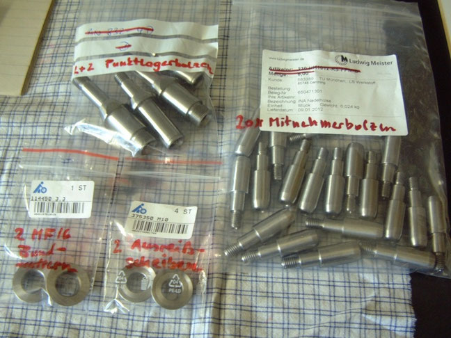 Some of the many machined tight tolerance bolts, washers and nuts of the suspension prior to galvanizing