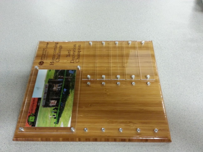 Some of the awards were fitted with custom standoffs made on our CNC lathe.