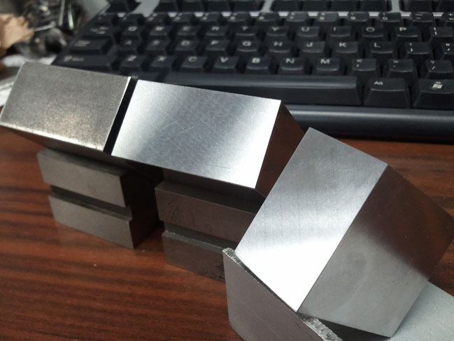 Three stages of a project that required some blocks ground to a dimensional accuracy of  +/- .0005" (013mm).