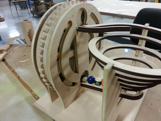 A scaled up version of a marble machine found on the web. http://msraynsford.myshopify.com/products/marble-machine-1