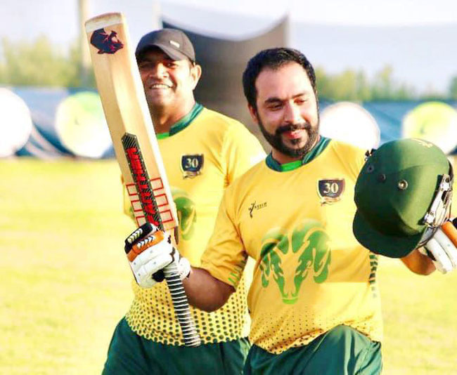 Mehran Khan celebrates his century for Cyprus Moufflons