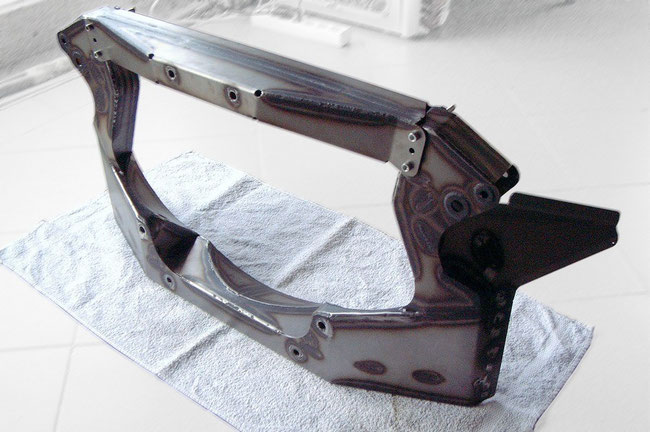 Rear bulkhead after welding and flame straightening, ready for painting and waxing