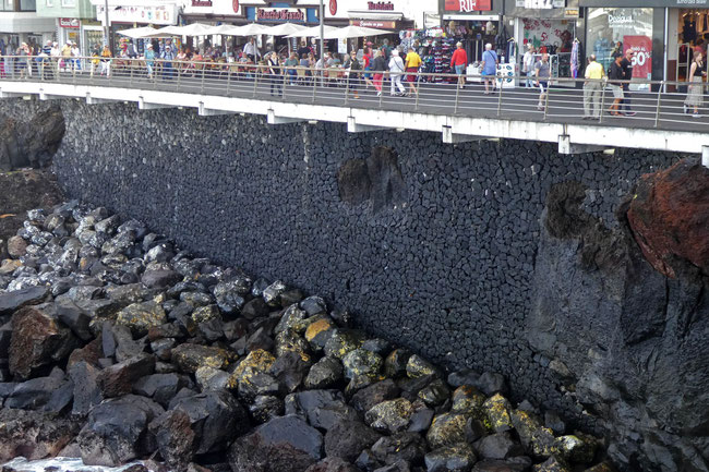 Hand-laid sea wall along Calle de San Telmo