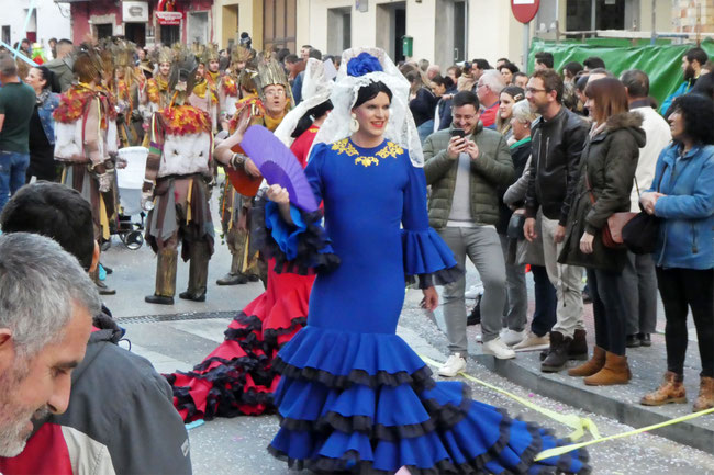 Men dressed as female flamenco dancers