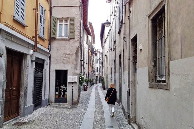 A narrow Street  in Como, Italy