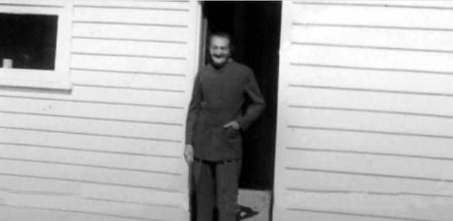 Meher Baba standing in the doorway. Photo courtesy of the Sydney Meher Baba web site.