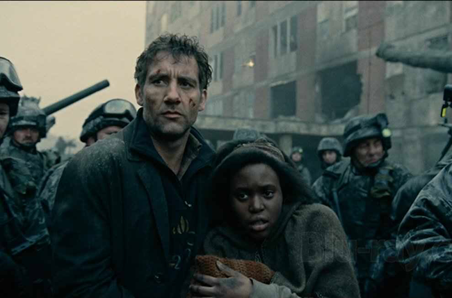 Clive Owen & Clare-Hope Ashitey in Children of Men