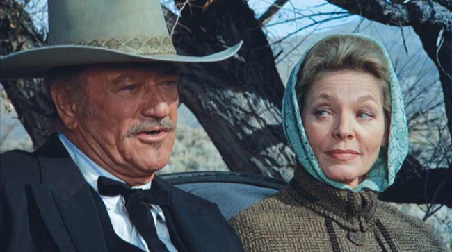 John Wayne & Lauren Bacall in The Shootist
