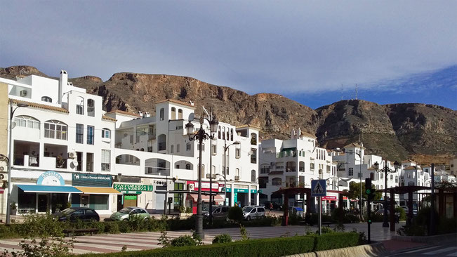 Avenida de Carlos III street scene with mountains 