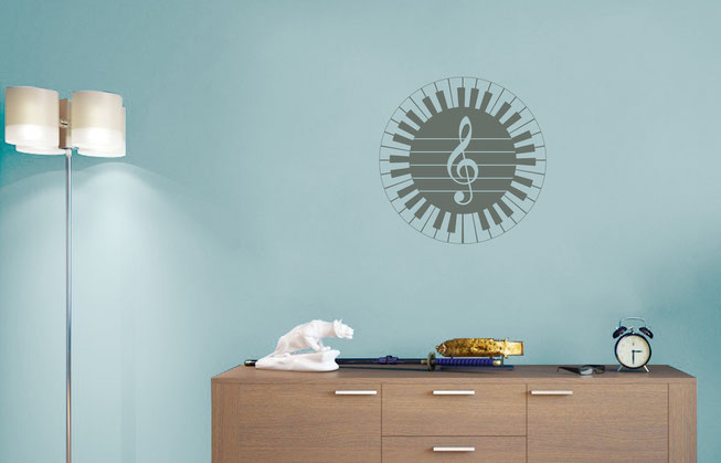 61 keyed piano vinyl wall art decal for music lovers, there is a treble clef in the centre of the  sticker. From www.wallartcompany.co.uk