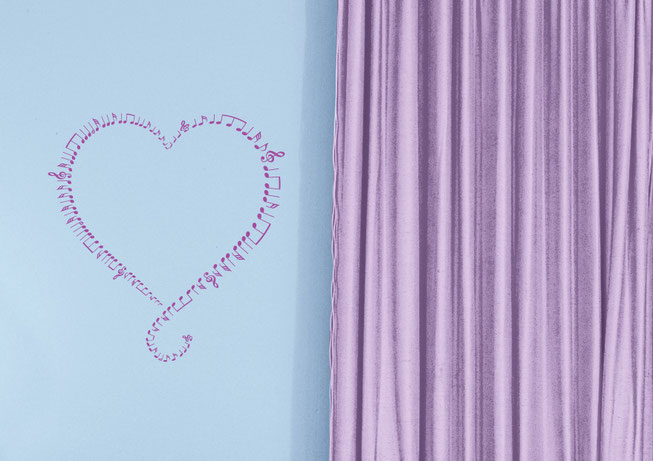 Music notes going around a heart vinyl wall art decal. Various colours from www.wallartcompany.co.uk