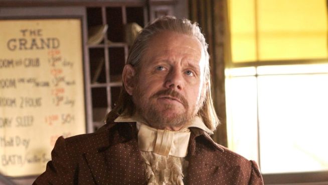 E. B. Farnum, played by William Sanderson.