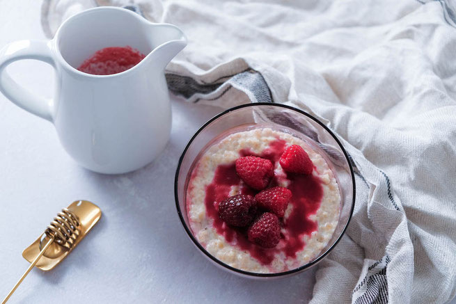 Scottish porridge with raspberry coulis and honey