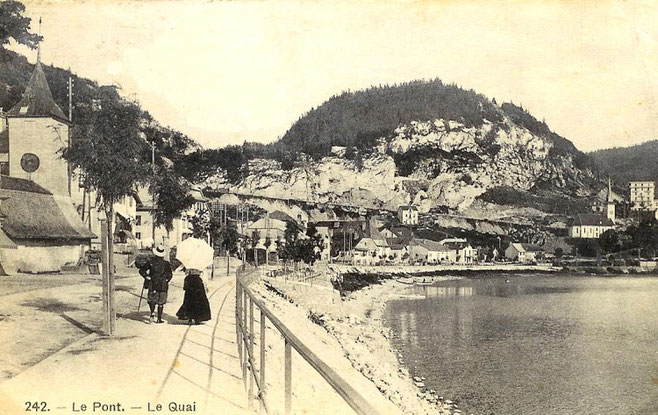 The English promenade, with both churches in view. On the left side of the photo is the former church which would soon be demolished to make room for the new civic center