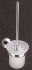 Toilet brush in wall mount glass holder - round