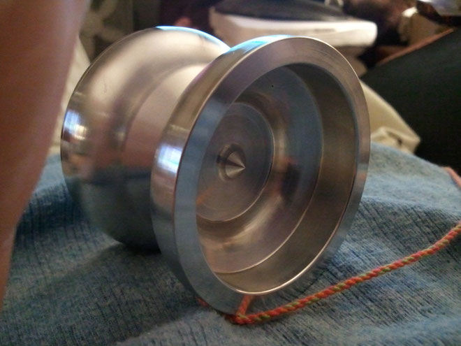 An aluminum yoyo created as a design challenge. The deep face cavity required a special face-grooving tool. 