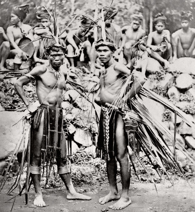 Two Ifugaos dressed for the cock fight dance, 1903. John Tewell photo collection.