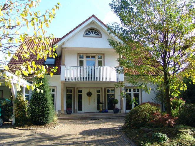 Einfamilienhaus in 49170 Hagen a.T.W. - Architektenhaus mit massiver 2-schaliger mineralischer Putzfassade - Massivhaus
