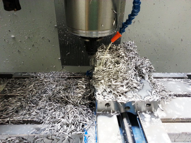 A pretty nice pile of chips made while creating a part for NIMS CNC mill certification.