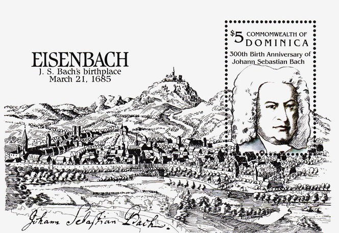 Es ist ein traumhafter schwarzweißer Briefmarkenblock aus Domenica. Bildfüllend sieht man den Holzstich von Eisenach mit Wartburg. Oben rechts ist die perforierte Briefmarke mit Bach-Porträt. Links oben im Himmel der Stadtansicht steht groß EISENBACH.