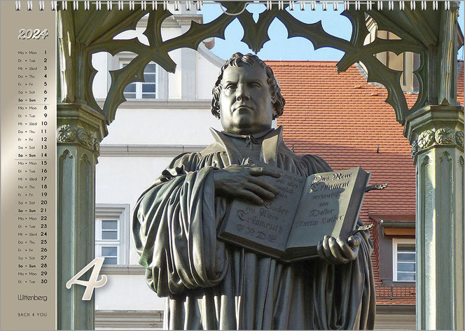 Ein Foto im Luther-Kalender ... ein Monatsblatt. Luther steht inform eines Denkmals unter einem Baldachin. Links ist auf goldenem Untergrund das Kalendarium.