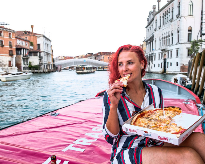 Eating pizza in Venice, Italy