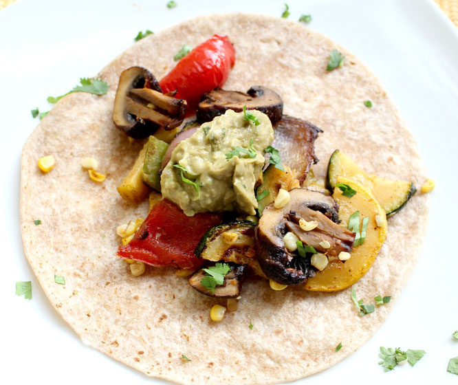 Vegan grilled veggie tacos are perfect for a light spring or summer dinner!  These can also be made in the oven and keep very well as leftovers - www.homemadenutrition.com