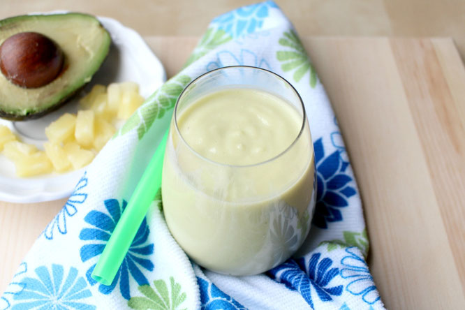 fast four ingredient avocado smoothie with pineapple, orange, and greek yogurt - so creamy and full of nutrition!  www.homemadenutrition.com