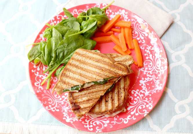 This Italian chicken panini comes together in minutes and is perfect for a quick weeknight meal!  Plus it can be made all in one skillet or on a panini press, so cleanup is a breeze! - www.homemadenutrition.com