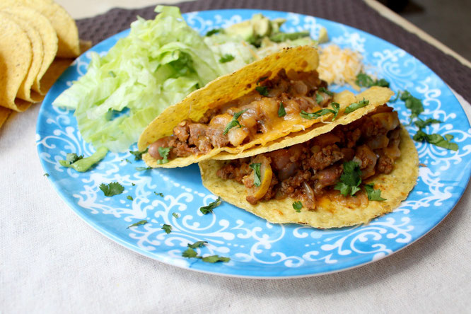 Easy, cheesy beef tacos are so simple to make with just a few healthy ingredients and about 20 minutes total.  Easy high protein, gluten free weeknight dinner! www.homemadenutrition.com