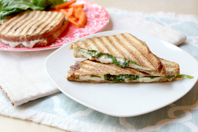 This Italian chicken panini comes together in minutes and is perfect for a quick weeknight meal!  Plus it can be made all in one skillet or on a panini press, so cleanup is a breeze! - www.homemadenutrition.com