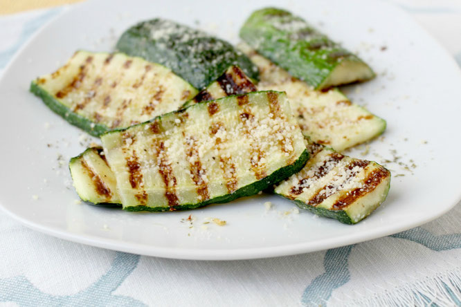 Grilled parmesan zucchini is one of the best ways to enjoy this delicious family-friendly veggie.  This recipe has only 5 main ingredients and comes together in minutes!  You can also use this several different ways.  www.homemadenutrition.com