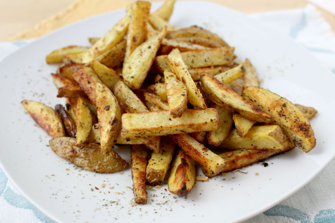 These easy baked french fries have all of the texture and flavor you'd expect from regular fries, but are a much lighter alternative.  Healthy and family-friendly side dish!