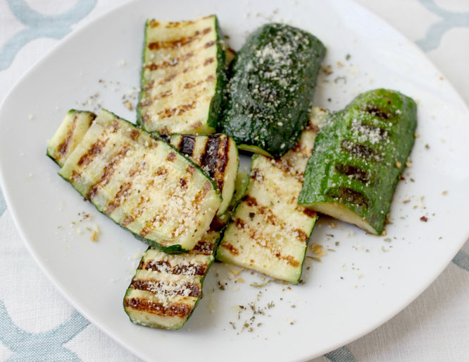 Grilled parmesan zucchini is one of the best ways to enjoy this delicious family-friendly veggie.  This recipe has only 5 main ingredients and comes together in minutes!  You can also use this several different ways.  www.homemadenutrition.com